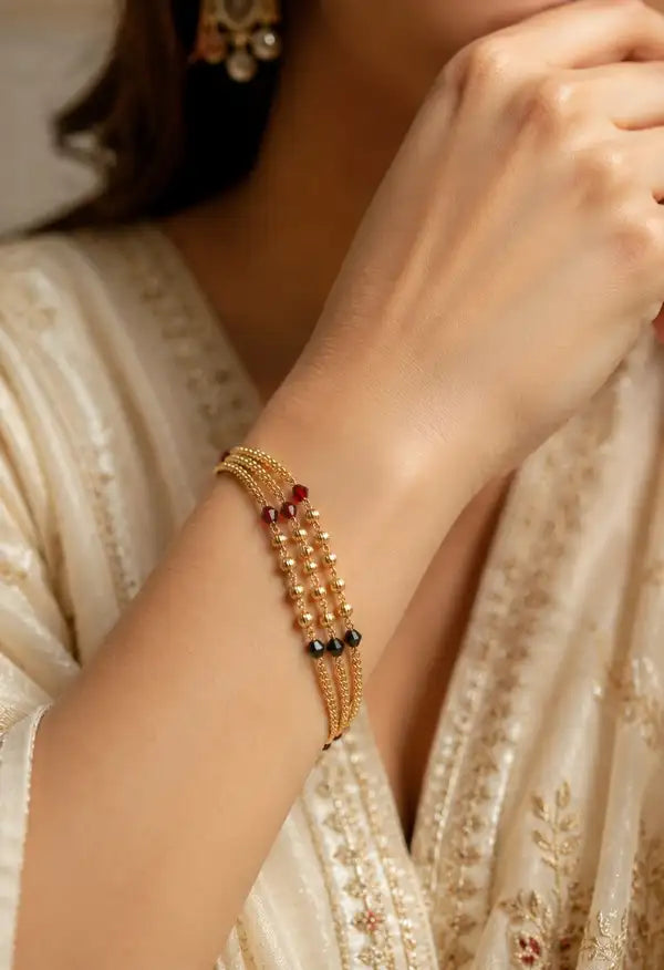 Premium Gold-Plated Bhabhi Rakhi with Pearl & Ruby Beads
