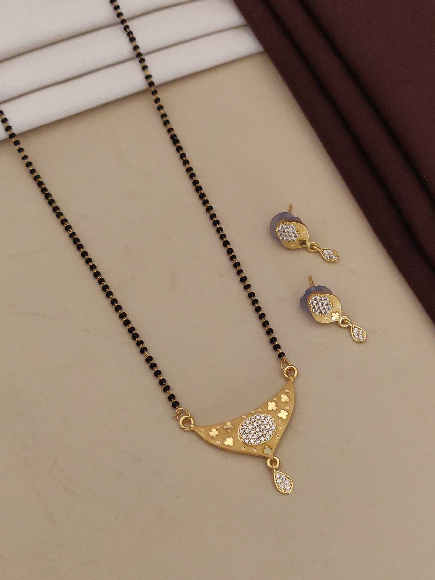 Forming Ad Diamond High Gold Plated Oval Mangalsutra   3 Months Guarantee