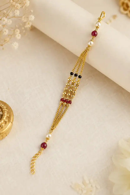 Premium Gold-Plated Bhabhi Rakhi with Pearl & Ruby Beads