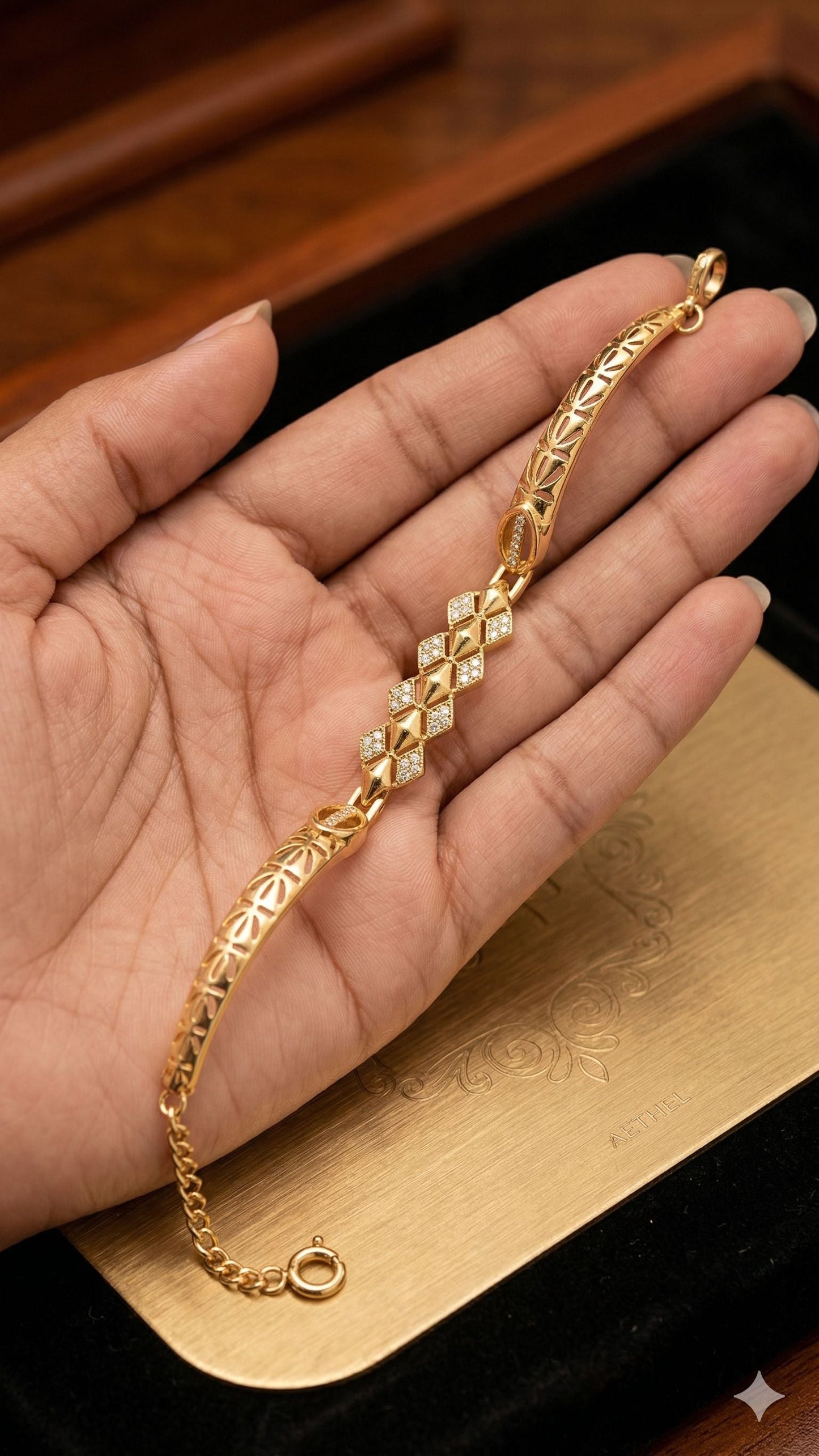 Elegant Gold-Plated Floral Link Bracelet with AD Stone triangle shape adjustable bracelet