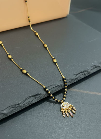 Graceful Black Gold Plated Bead And Diamond Pendant Mangalsutra